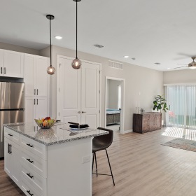 Beautiful living spaces with natural lighting Well-lit kitchen with ample counter space